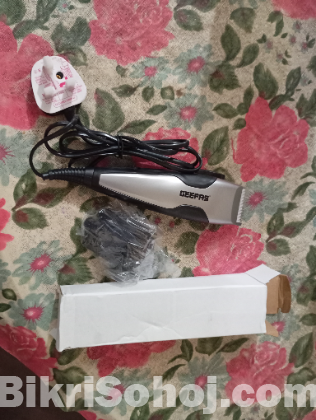 Electronic corder hair trimmer